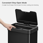 EKO Trash Can with open lid and hand pressing the "Stay Open Mode" button.