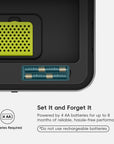 A close-up of an EKO trash can lid highlights battery slots. Text reads: "Set It and Forget It. Powered by 4 AA batteries for up to 8 months of reliable, hassle-free performance *Do not use rechargeable batteries*."