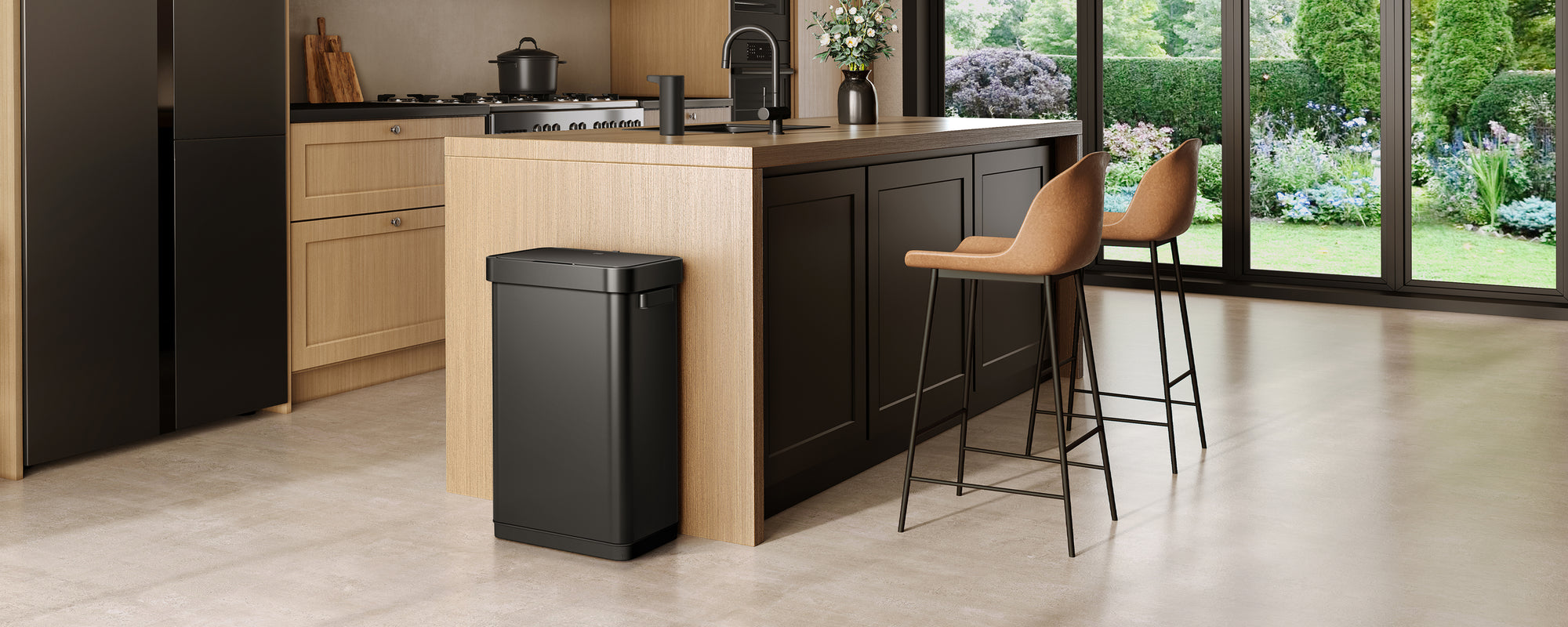 Modern kitchen with an EKO trash can in the foreground.